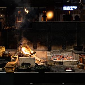 10 brilliant restaurants where it’s all about cooking over flames